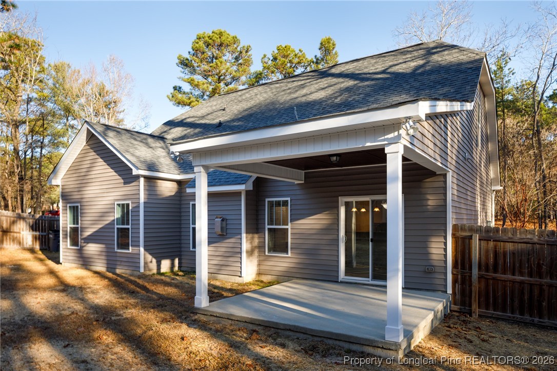 600 Burning Tree Road Pinehurst, NC 28374 - Photo 30 of 31 a view of a house with a door and wooden walls