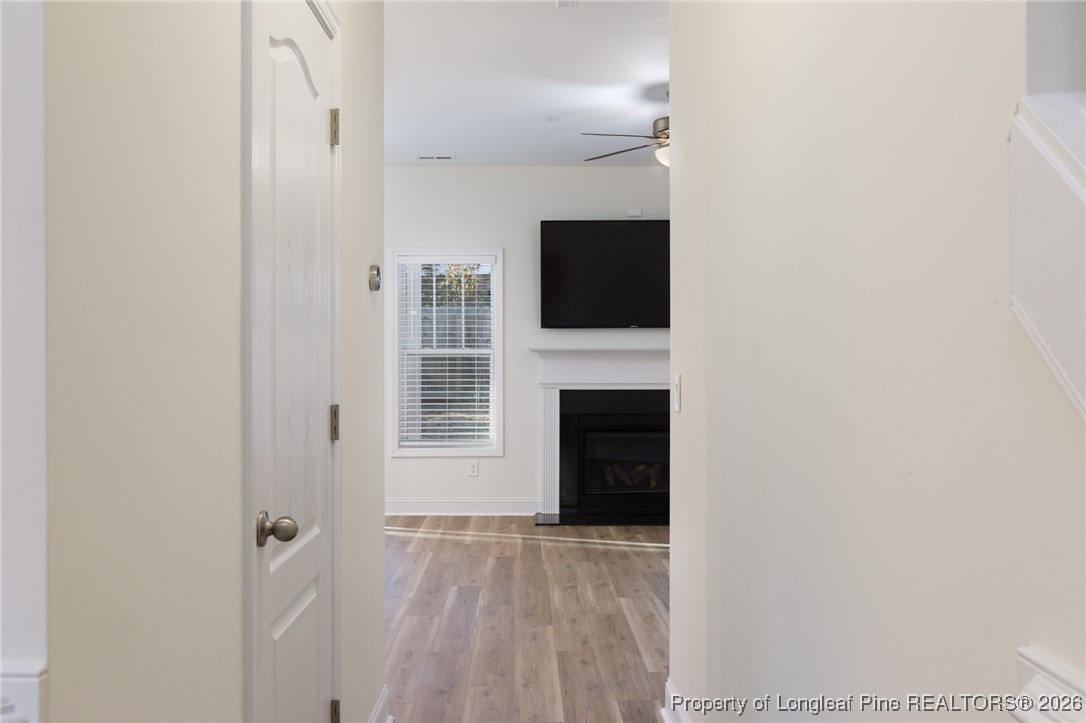 600 Burning Tree Road Pinehurst, NC 28374 - Photo 6 of 31 a view of a livingroom with a fireplace