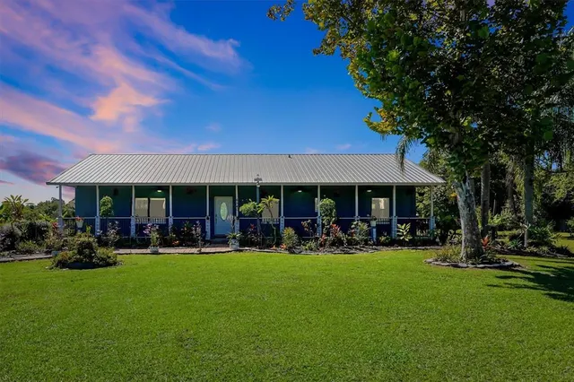 a couple of table and chairs in the patio