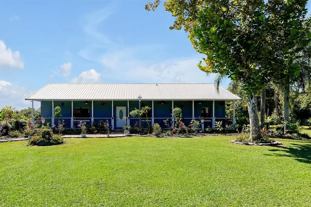 a view of a house with a garden