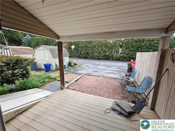 a garden view with a seating space