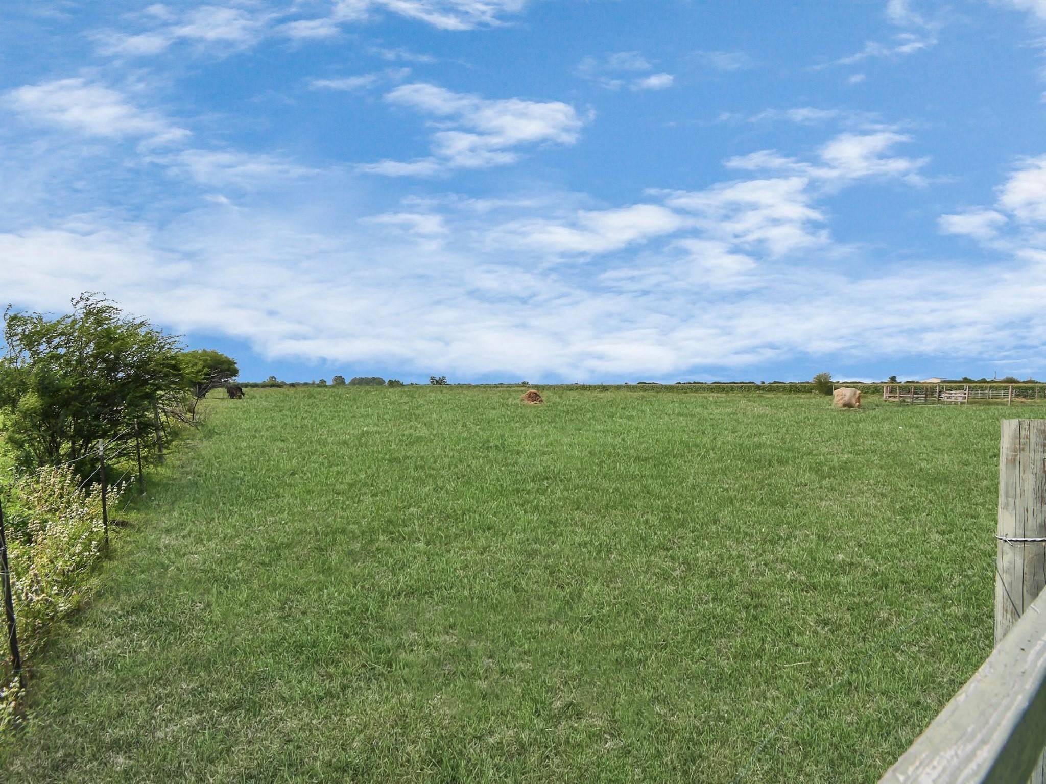 2787 Maler Road Sealy, TX 77474 - Photo 17 of 17 a view of a field with an outdoor space