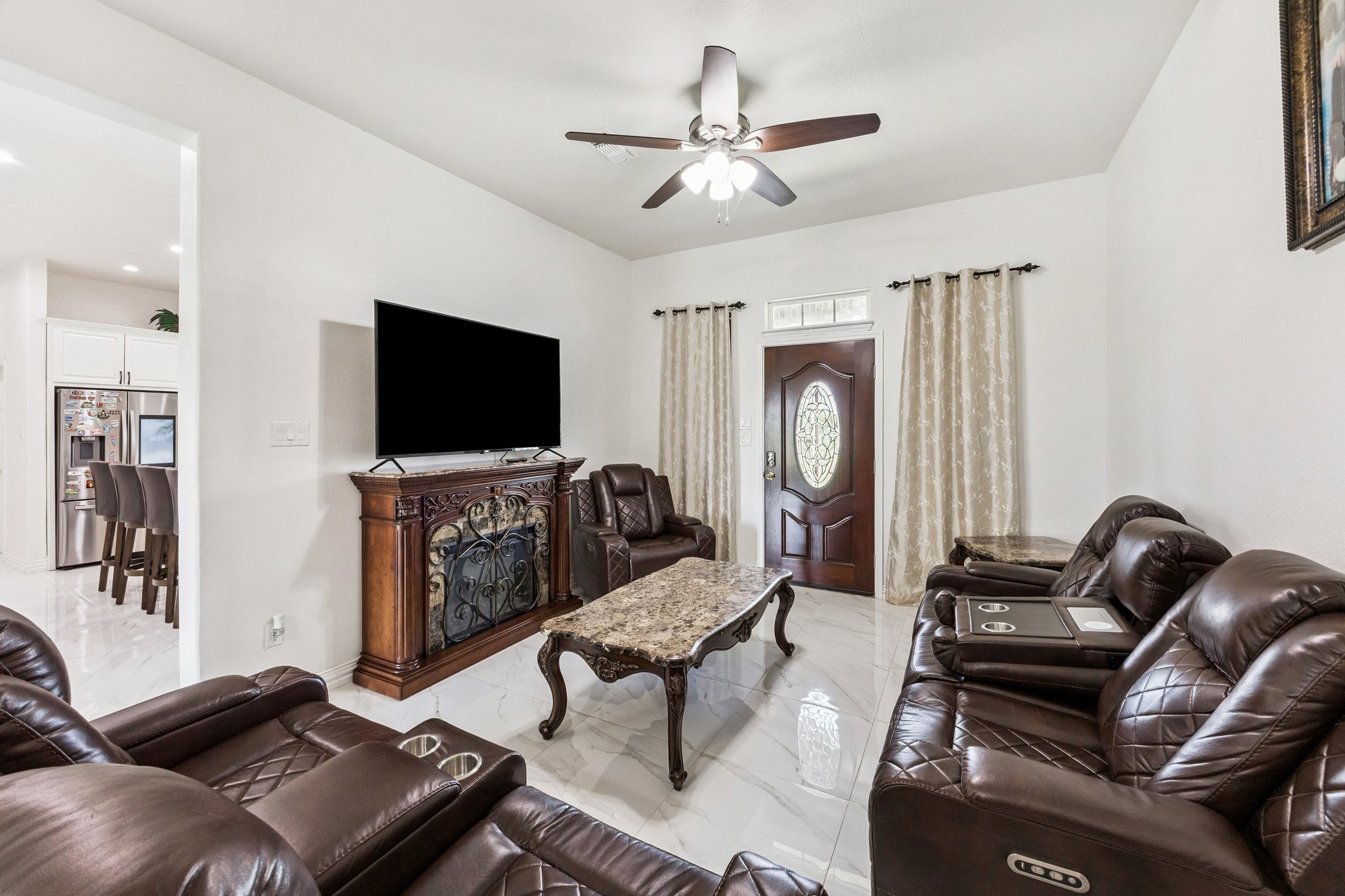 2787 Maler Road Sealy, TX 77474 - Photo 2 of 17 a living room with furniture and a flat screen tv