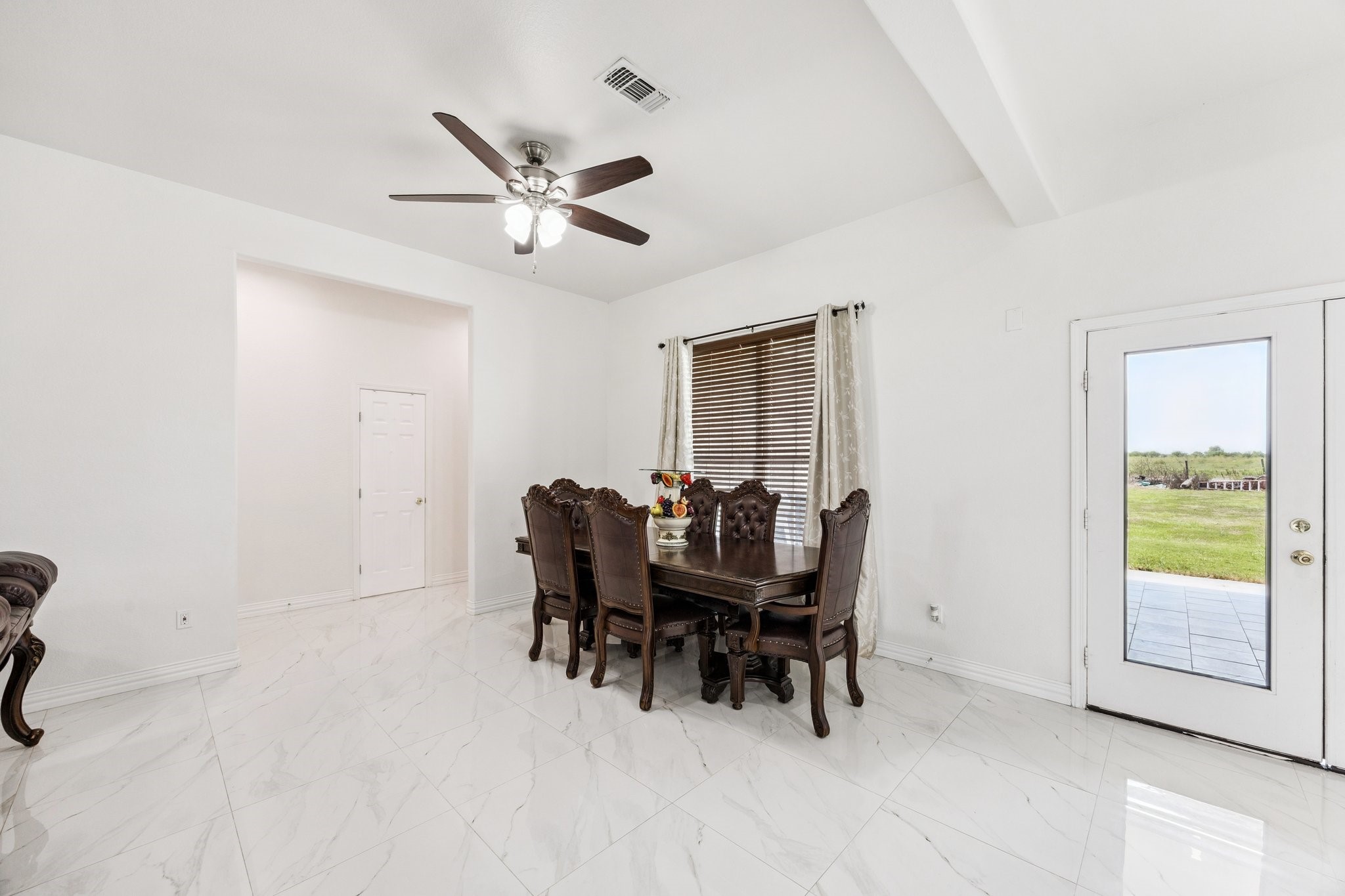 2787 Maler Road Sealy, TX 77474 - Photo 3 of 17 a view of a workspace with furniture and a window