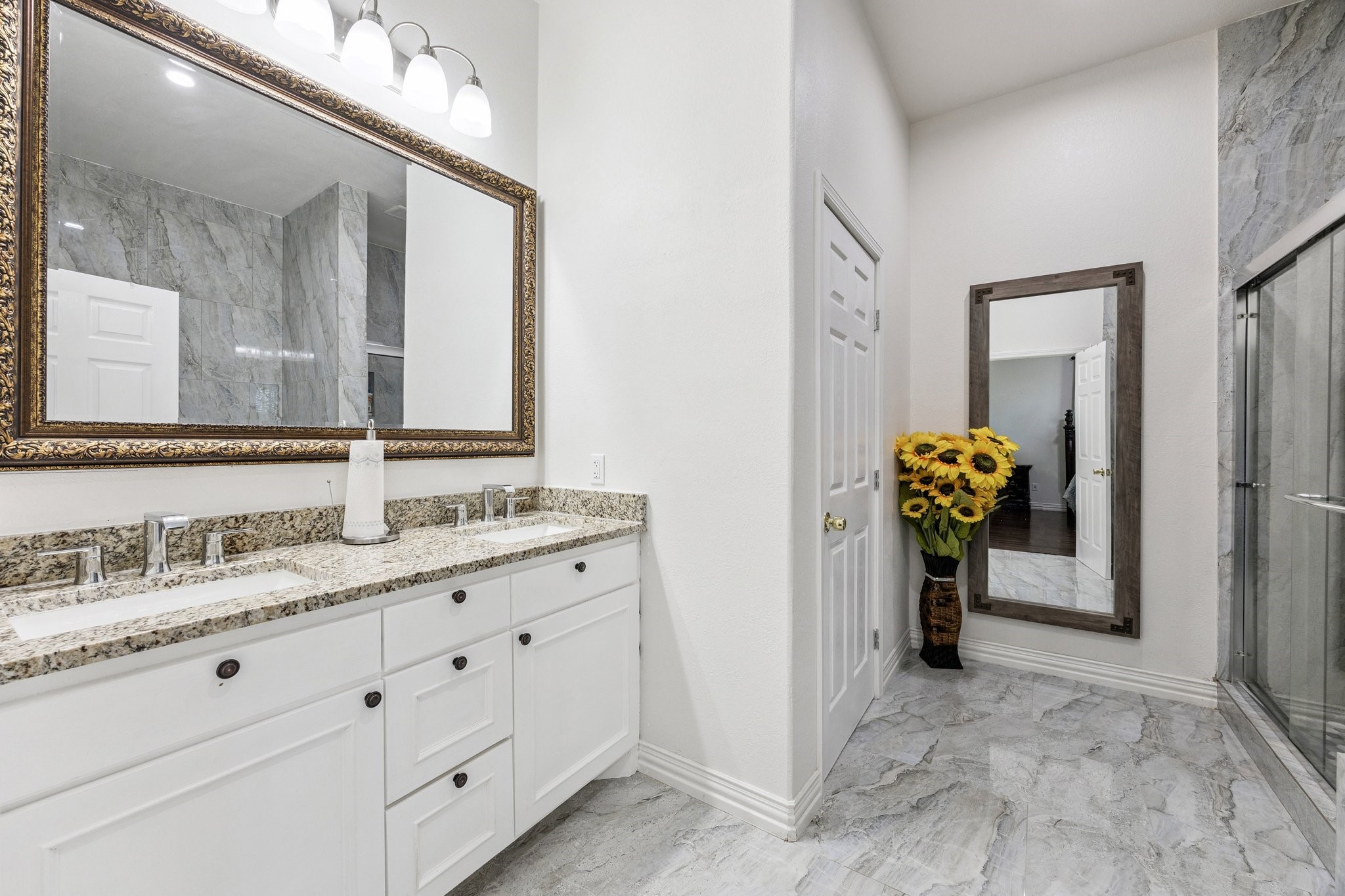 2787 Maler Road Sealy, TX 77474 - Photo 6 of 17 a bathroom with a sink and a mirror