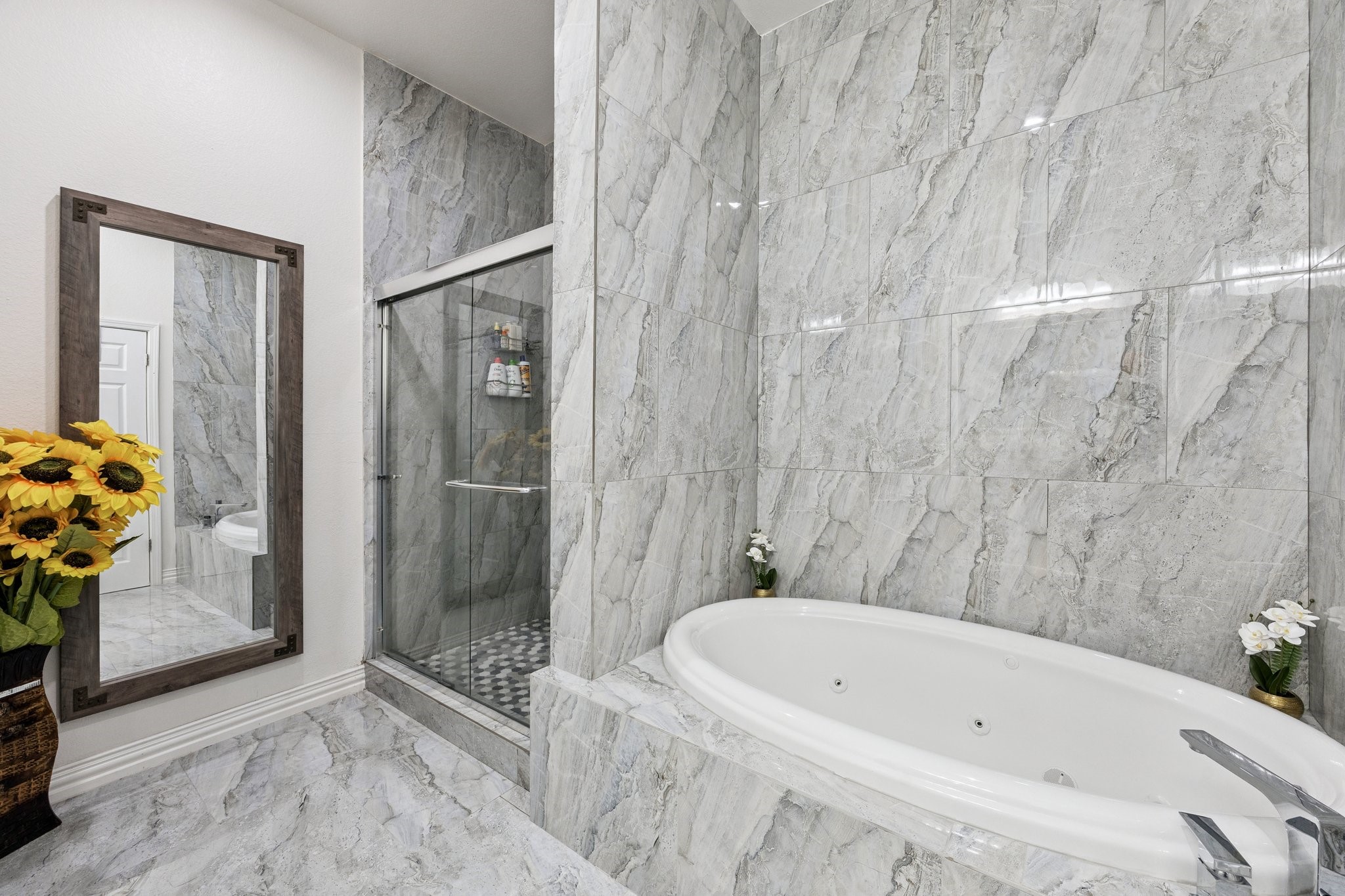 2787 Maler Road Sealy, TX 77474 - Photo 7 of 17 a bathroom with a tub and a shower