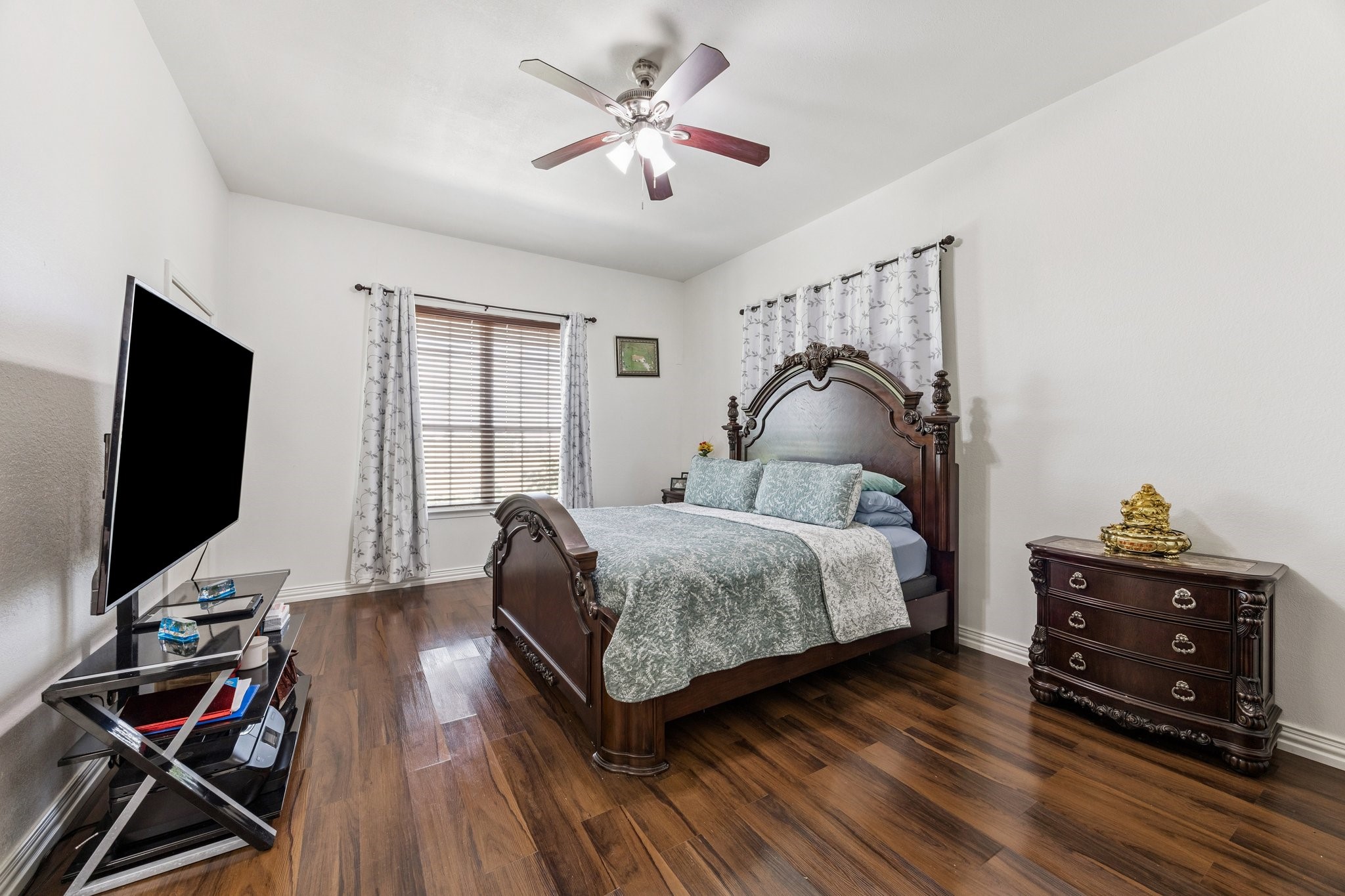 2787 Maler Road Sealy, TX 77474 - Photo 9 of 17 a bedroom with a bed and wooden floor