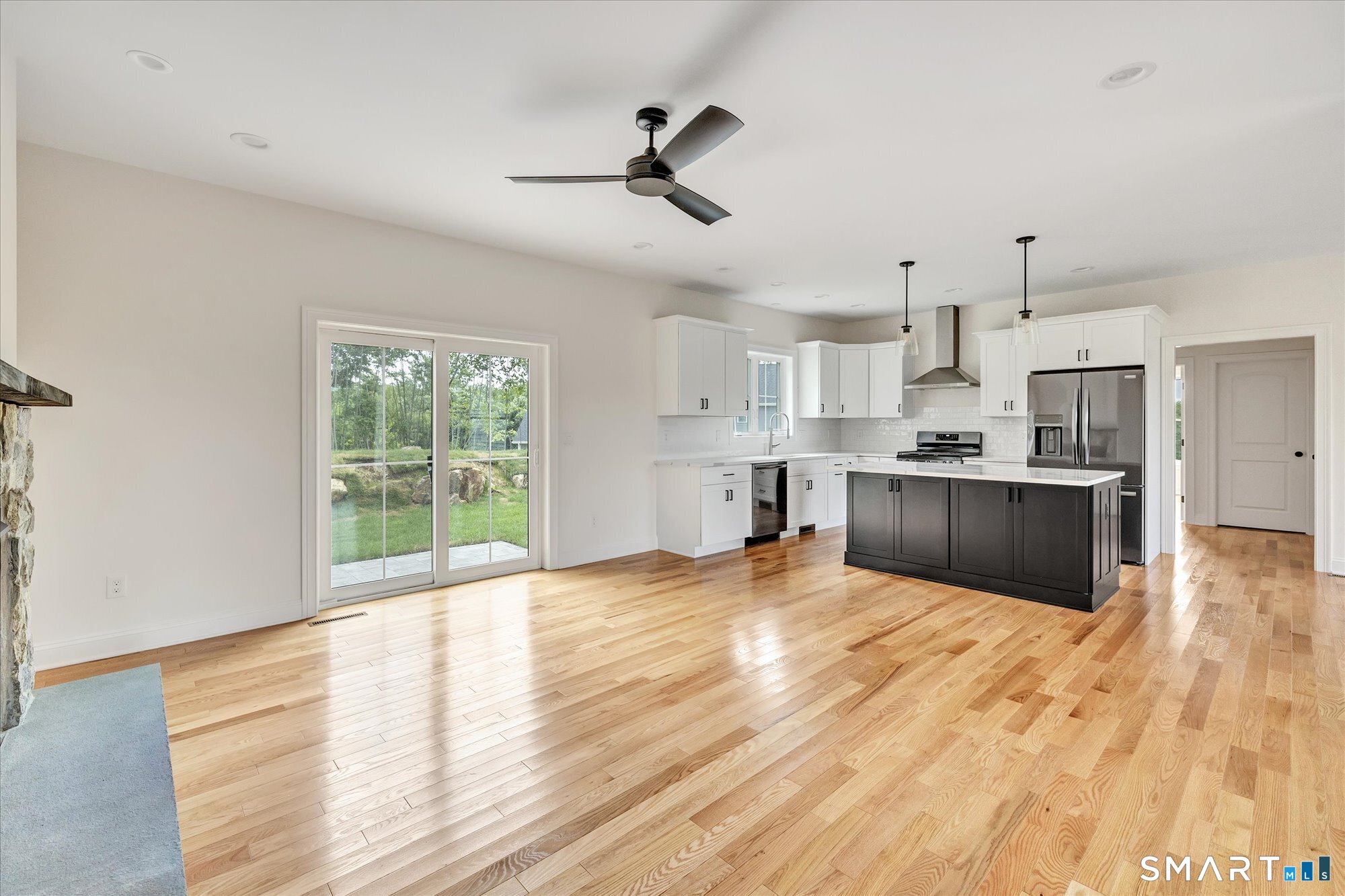 20 Hunting Ridge Road Middlebury, CT 06762 - Photo 12 of 29 a view of kitchen with wooden floor and window