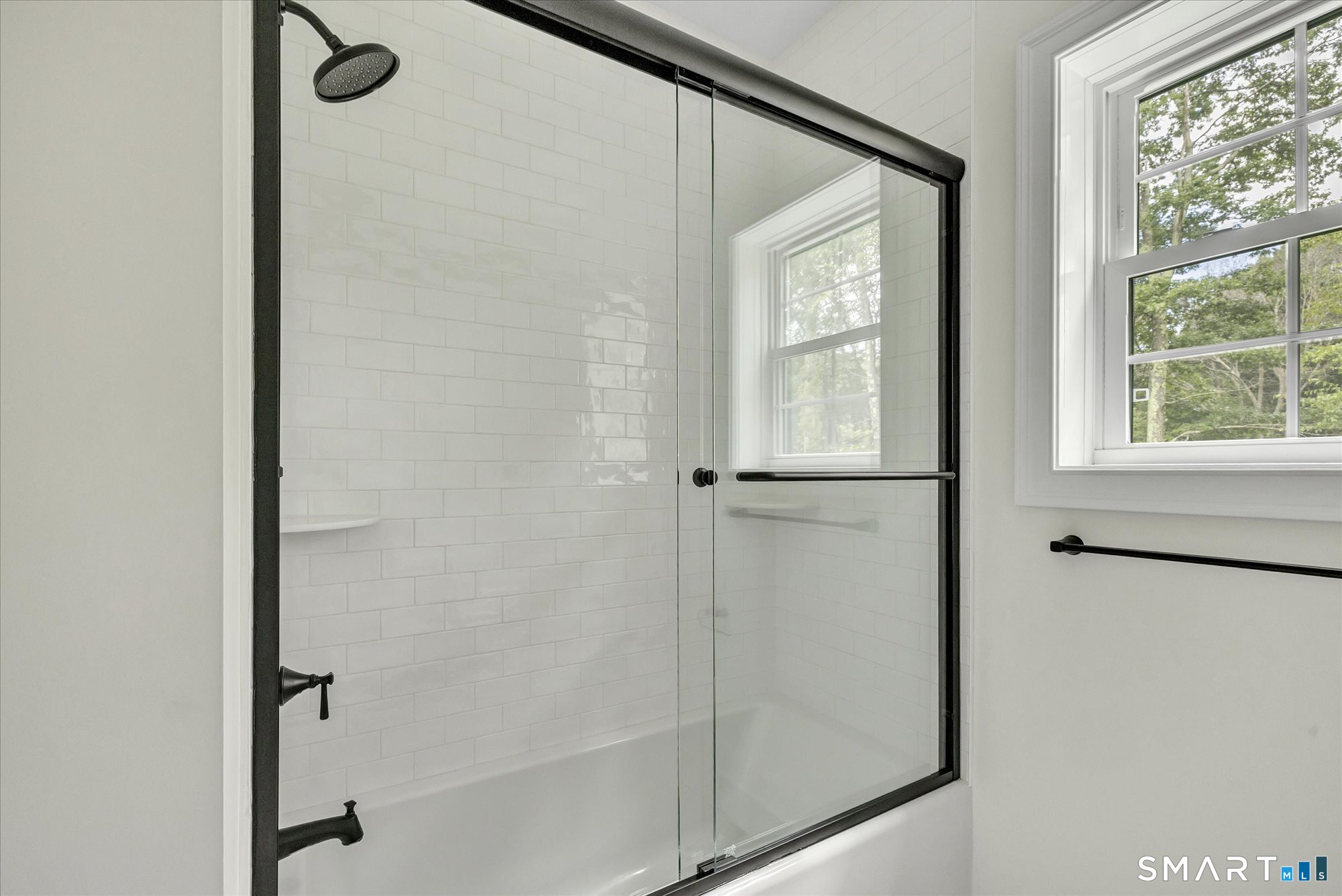 20 Hunting Ridge Road Middlebury, CT 06762 - Photo 22 of 29 a bathroom with a glass shower door