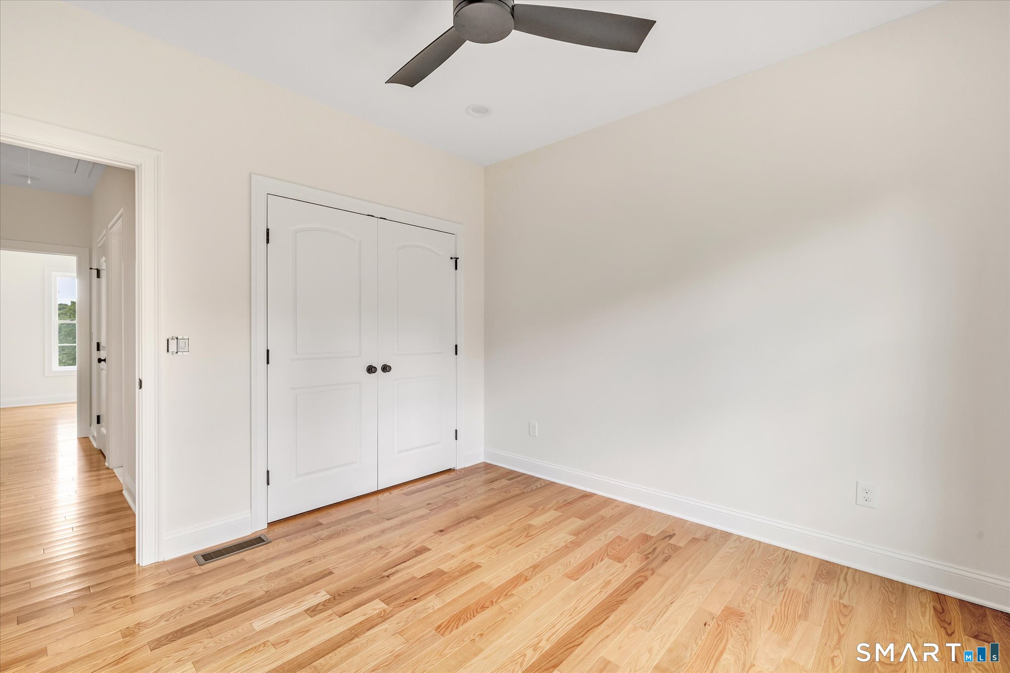 20 Hunting Ridge Road Middlebury, CT 06762 - Photo 24 of 29 a view of empty room with wooden floor
