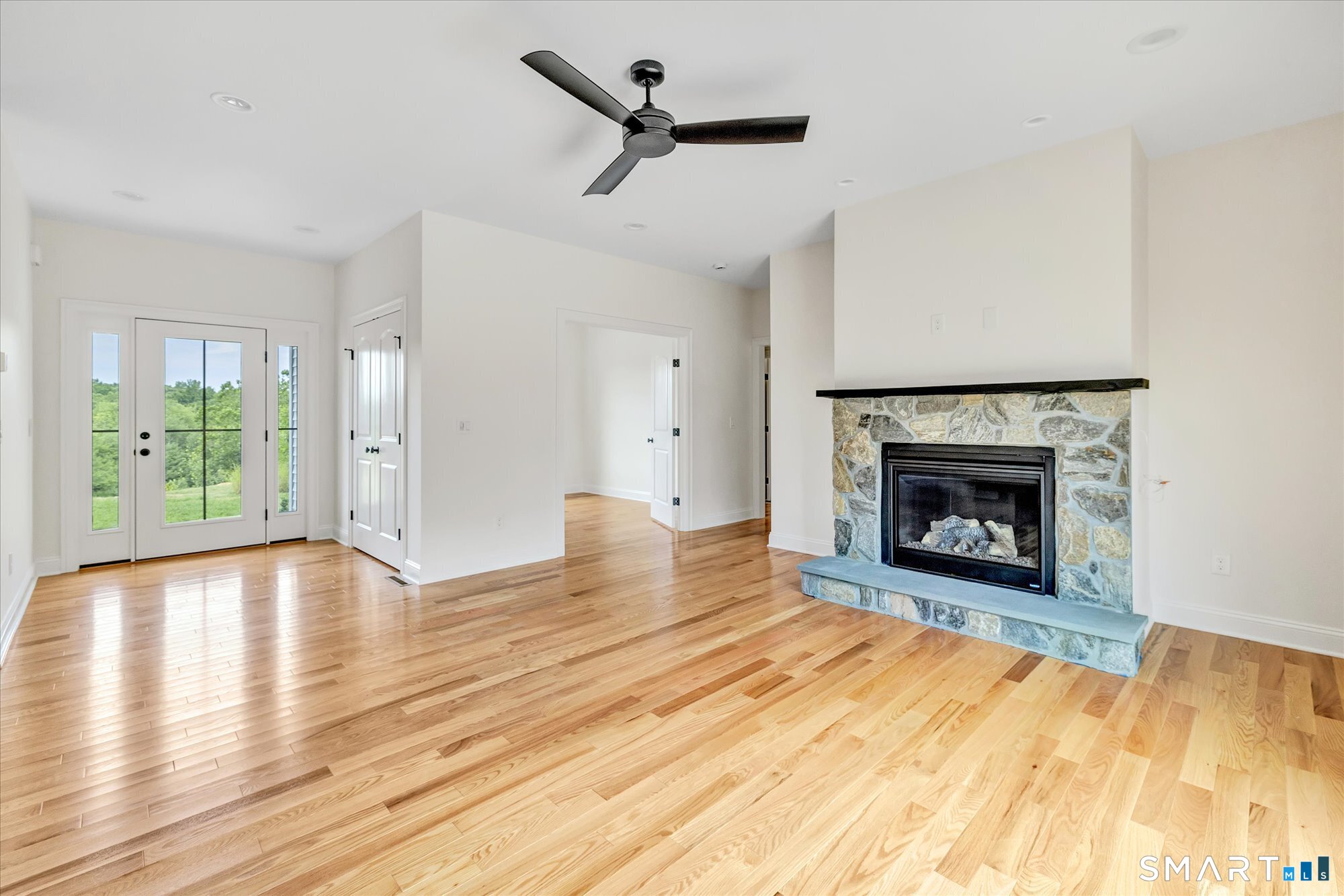 20 Hunting Ridge Road Middlebury, CT 06762 - Photo 6 of 29 a view of a livingroom with a fireplace and window