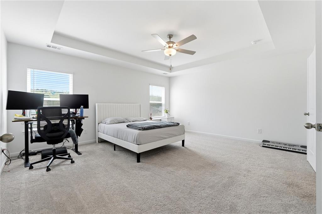760 Oakmont Trace Canton, GA 30114 - Photo 12 of 25 a bedroom with a workspace