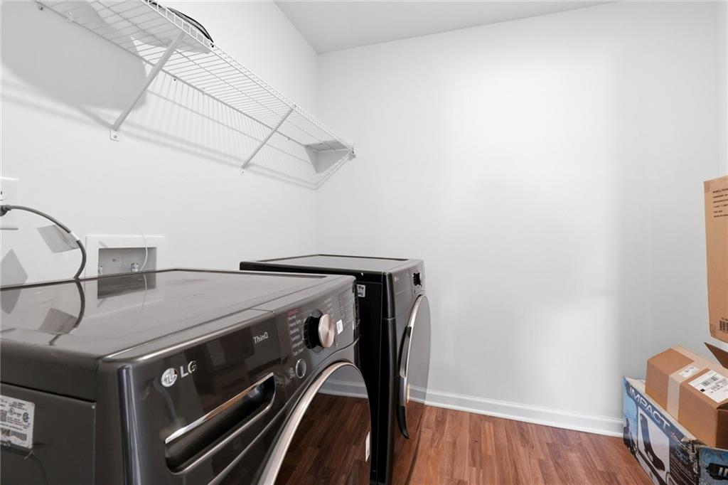 760 Oakmont Trace Canton, GA 30114 - Photo 19 of 25 a utility room with dryer and washer