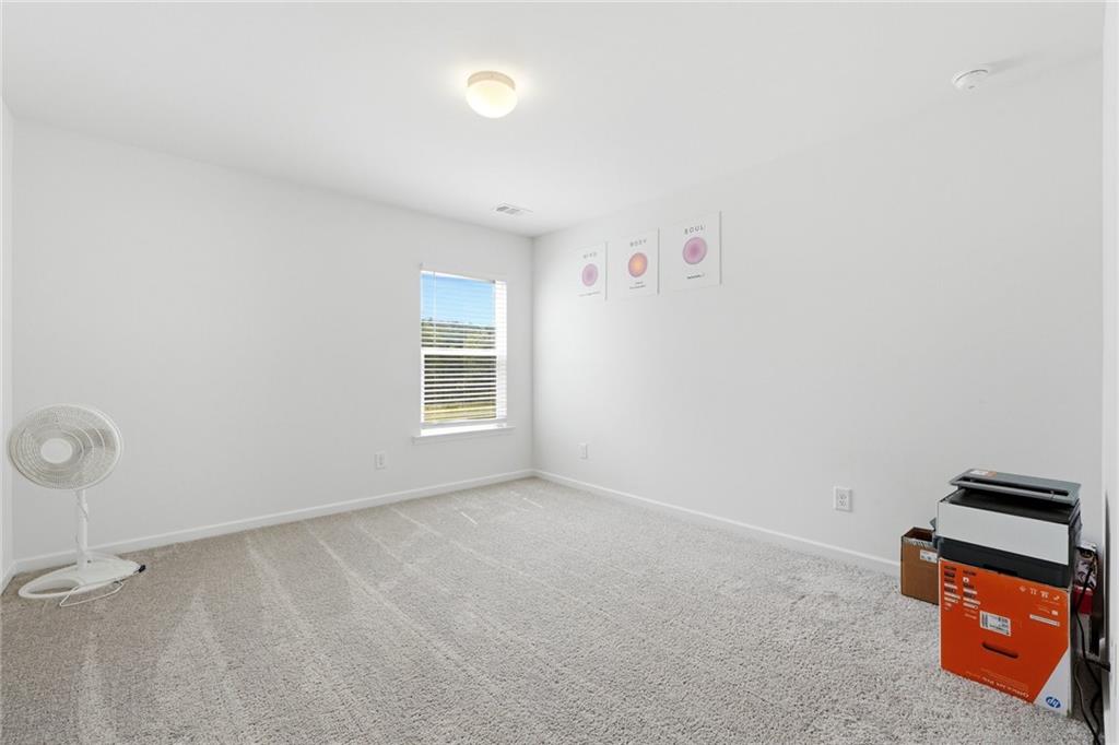760 Oakmont Trace Canton, GA 30114 - Photo 20 of 25 an empty room with windows