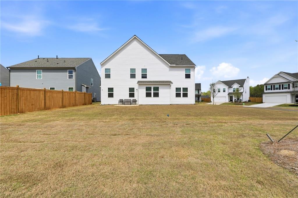 760 Oakmont Trace Canton, GA 30114 - Photo 25 of 25 a front view of a house with a yard