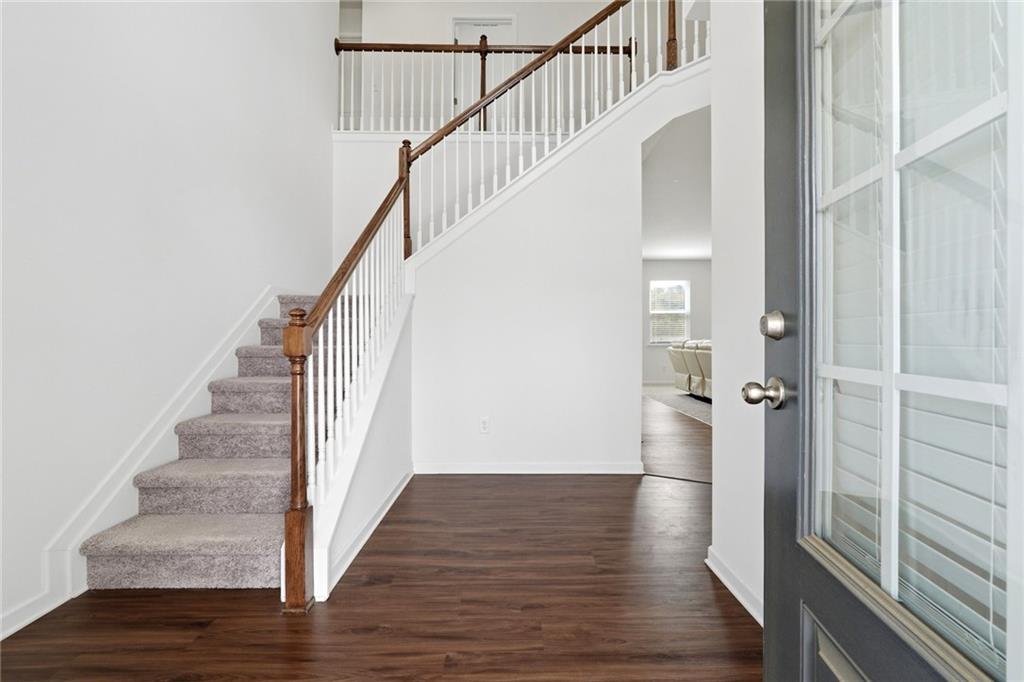 760 Oakmont Trace Canton, GA 30114 - Photo 3 of 25 a view of entryway with wooden floor