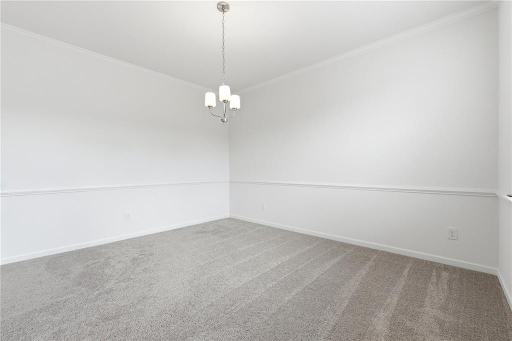 760 Oakmont Trace Canton, GA 30114 - Photo 4 of 25 a view of a room with an empty space