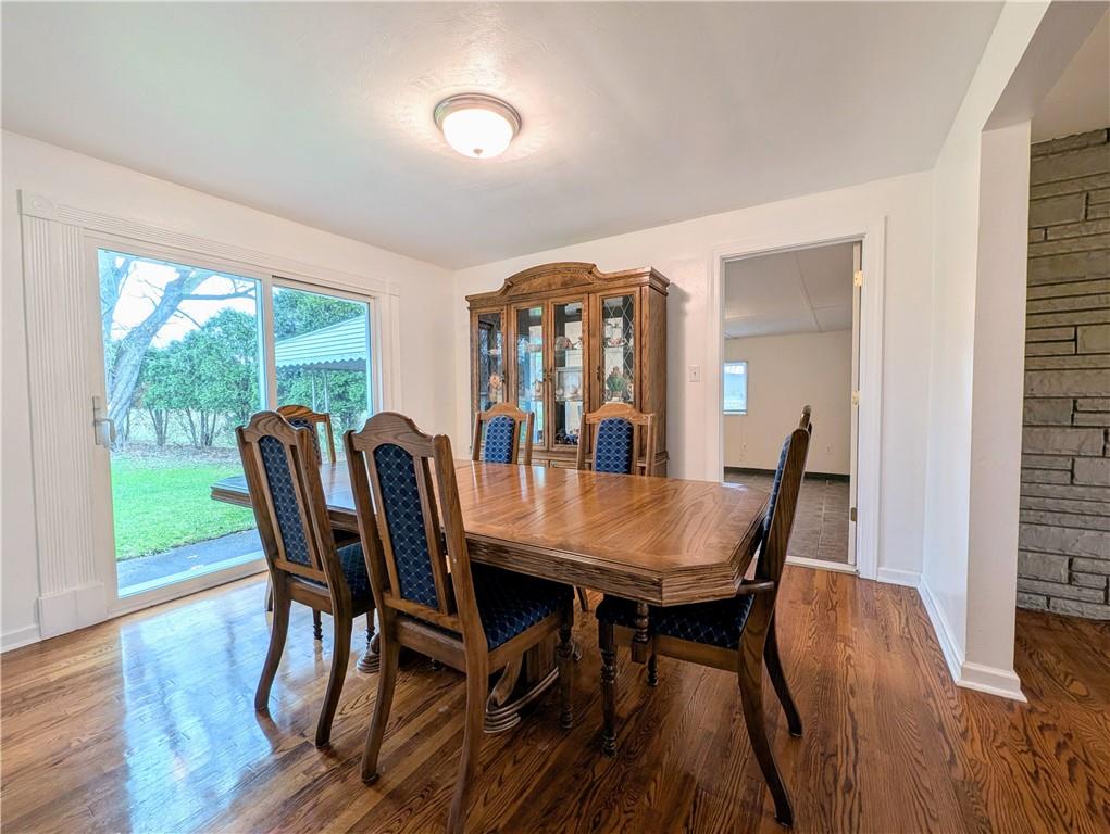 362 Mercer Road Harmony, PA 16037 - Photo 11 of 34 a view of a dining room with furniture window and wooden floor