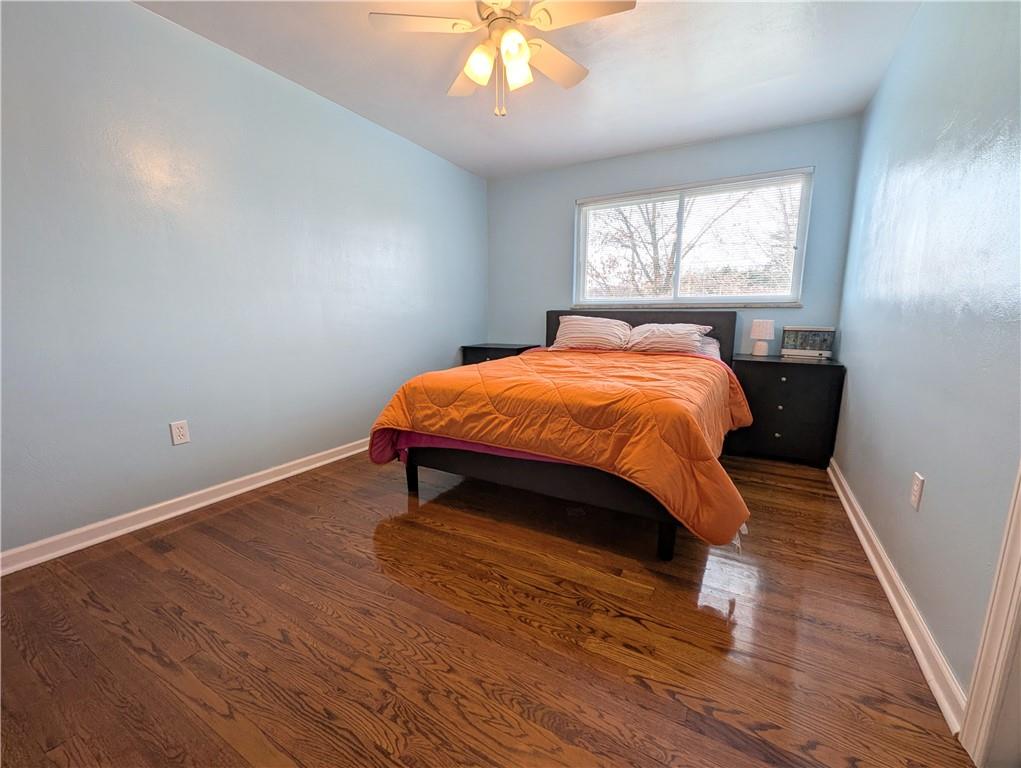 362 Mercer Road Harmony, PA 16037 - Photo 20 of 34 a bed sitting in a bedroom next to a window
