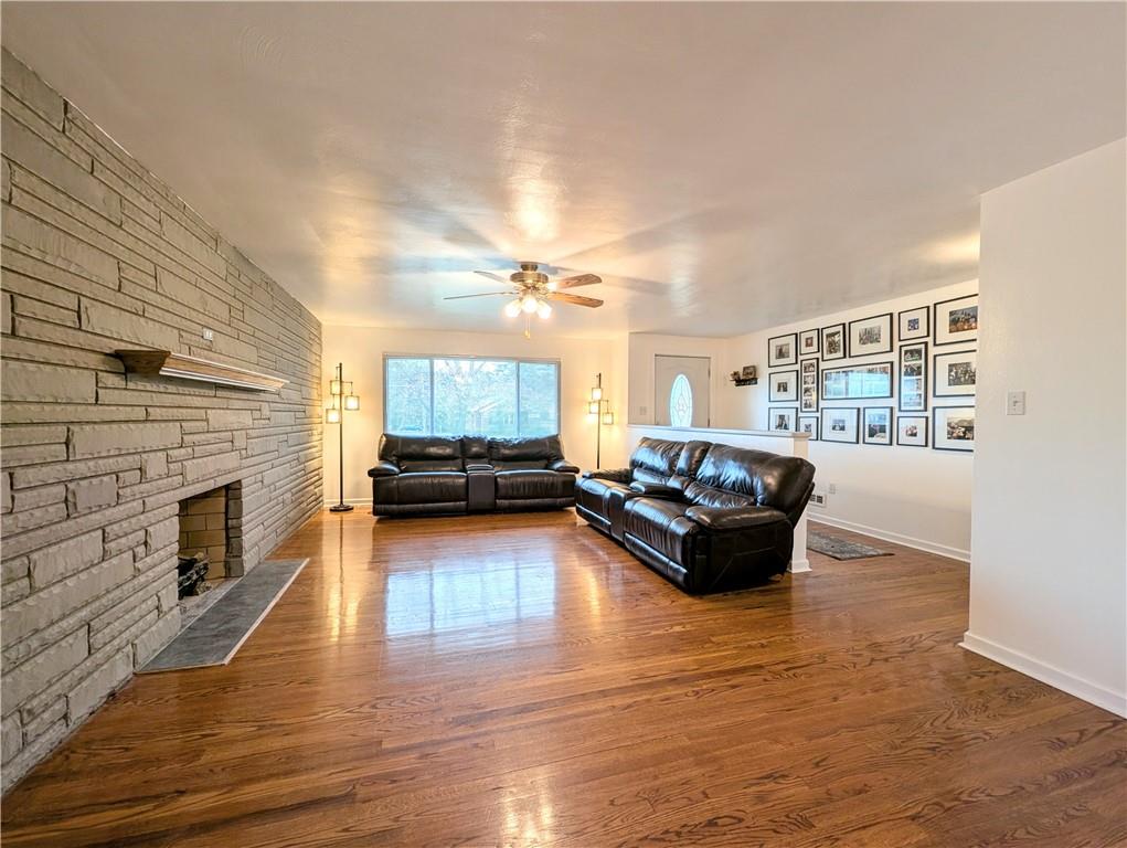 362 Mercer Road Harmony, PA 16037 - Photo 3 of 34 a living room with furniture and a fireplace