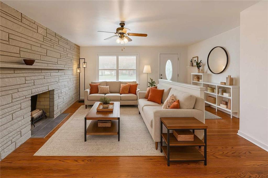 362 Mercer Road Harmony, PA 16037 - Photo 6 of 34 a living room with furniture and a fireplace