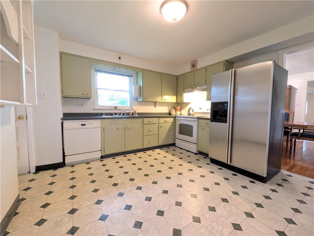 362 Mercer Road Harmony, PA 16037 - Photo 8 of 34 a kitchen with granite countertop a sink window and stainless steel appliances