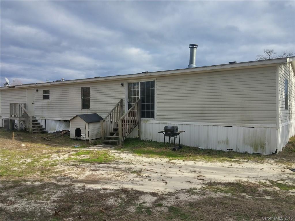 1818 State Rd S-28-55 Lugoff, SC 29078 - Photo 12 of 12 a view of a backyard