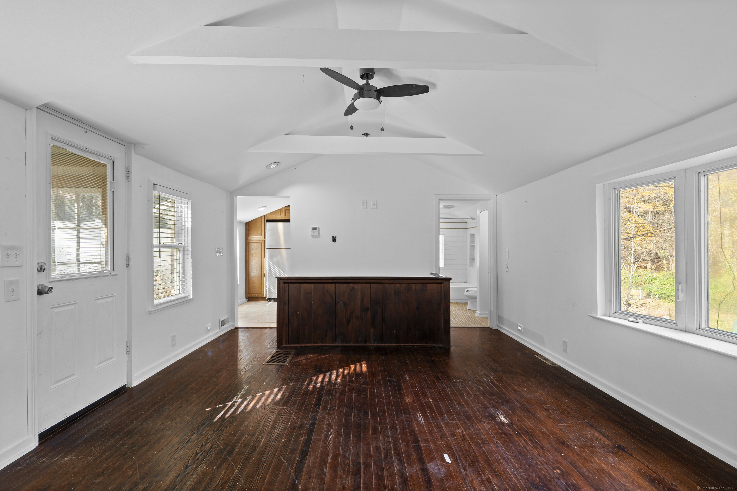 612 Kent Road New Milford, CT 06755 - Photo 16 of 35 a view of room with window ceiling fan and wooden floor