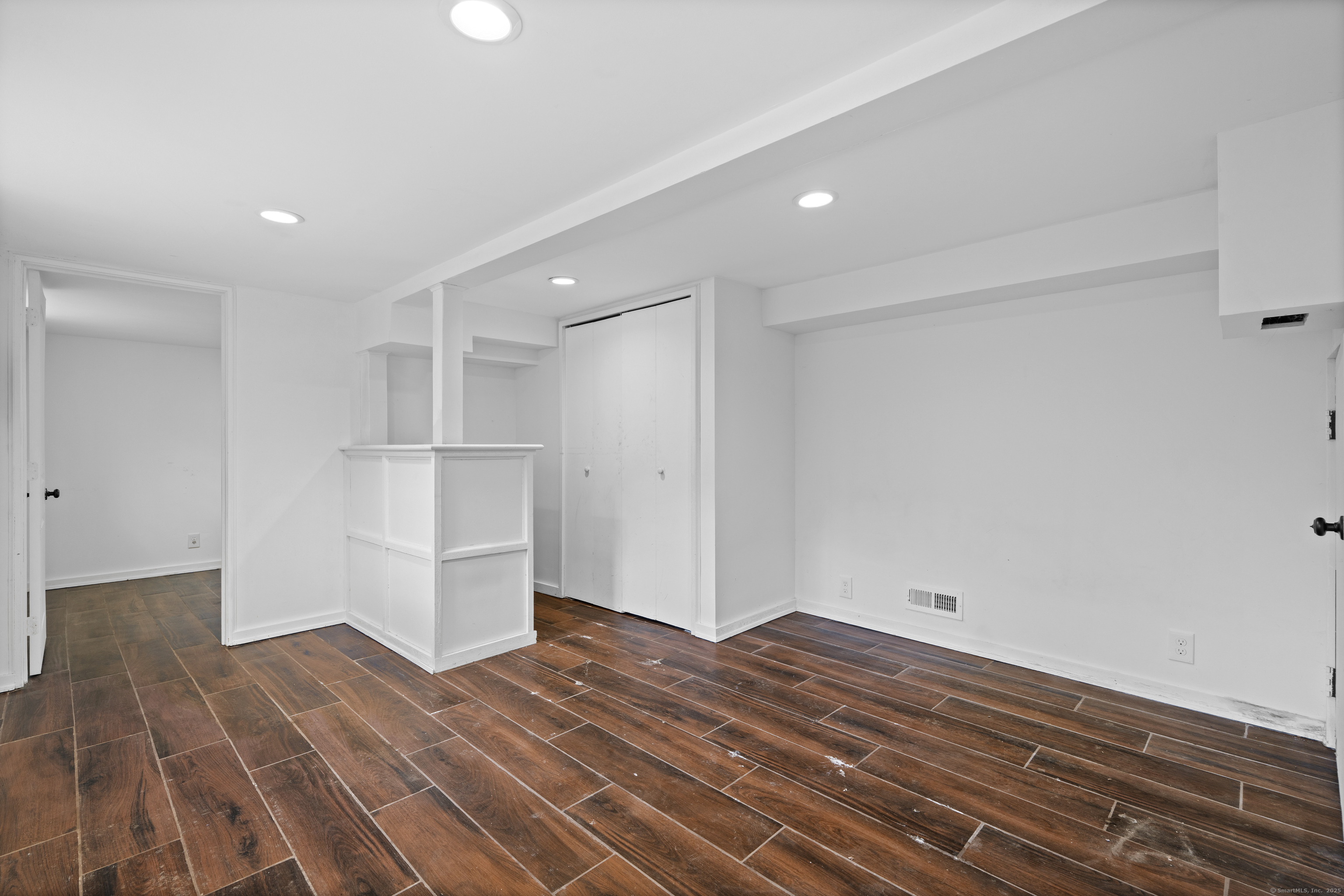 612 Kent Road New Milford, CT 06755 - Photo 24 of 35 a view of empty room with wooden floor