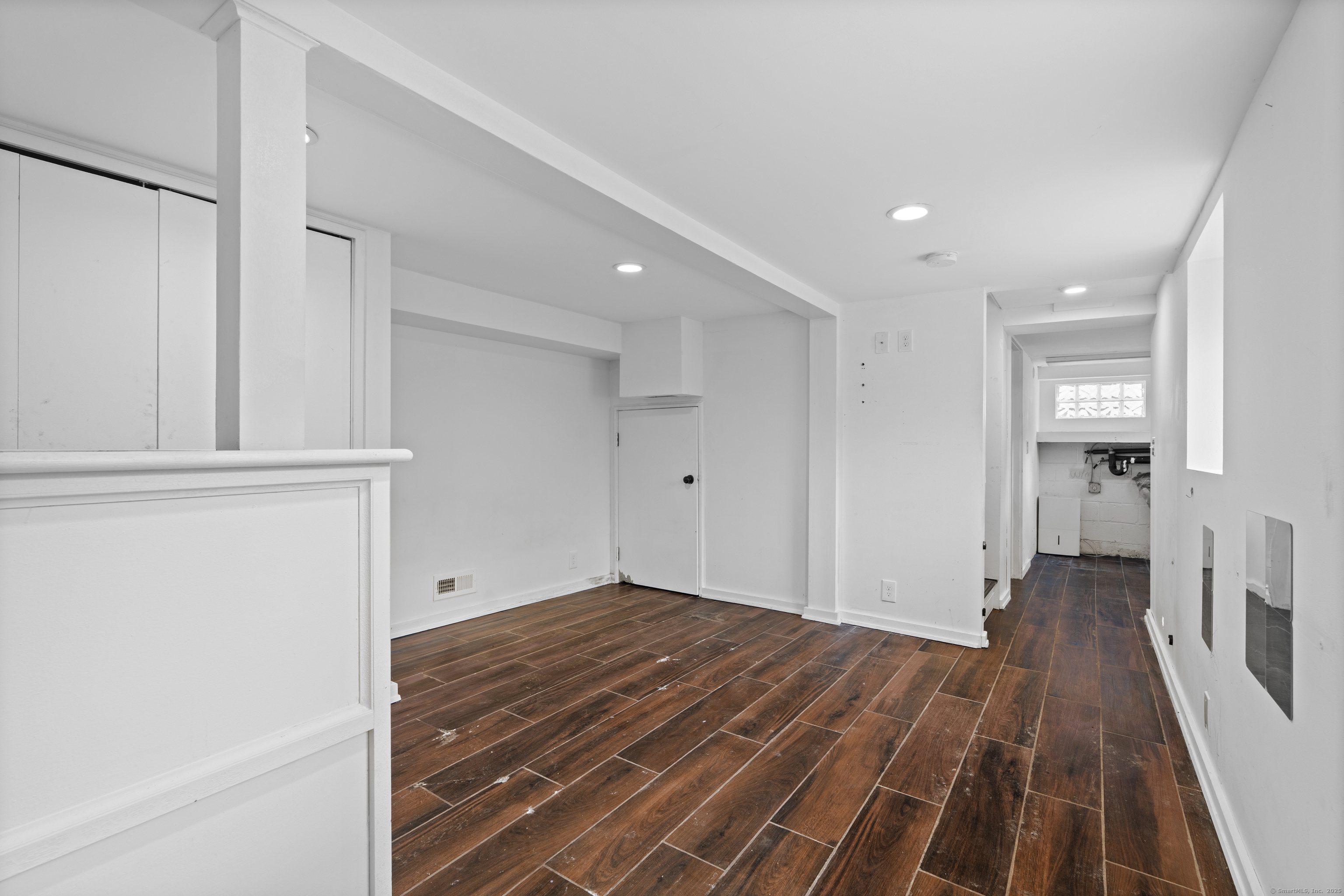612 Kent Road New Milford, CT 06755 - Photo 26 of 35 wooden floor in an empty room with a window