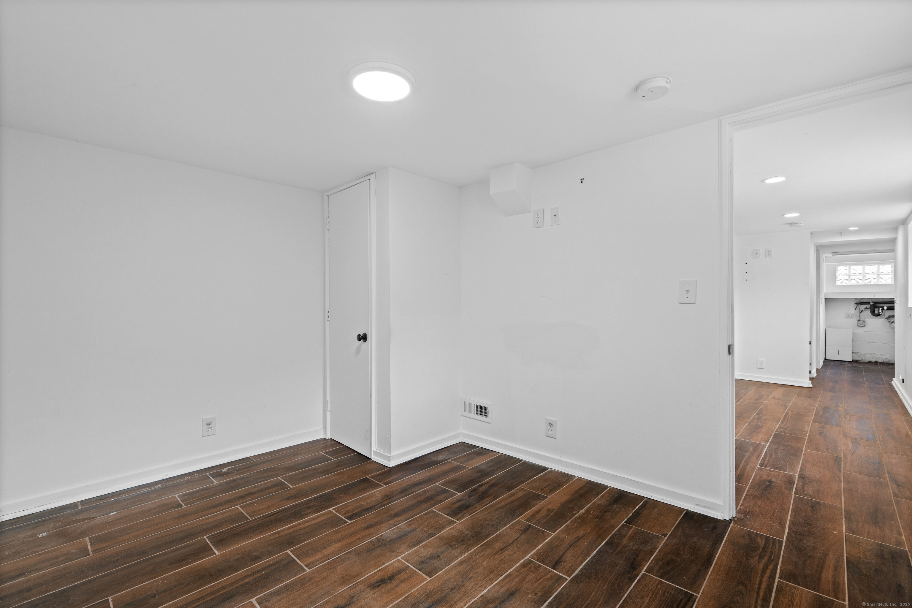 612 Kent Road New Milford, CT 06755 - Photo 28 of 35 a view of room with wooden floor