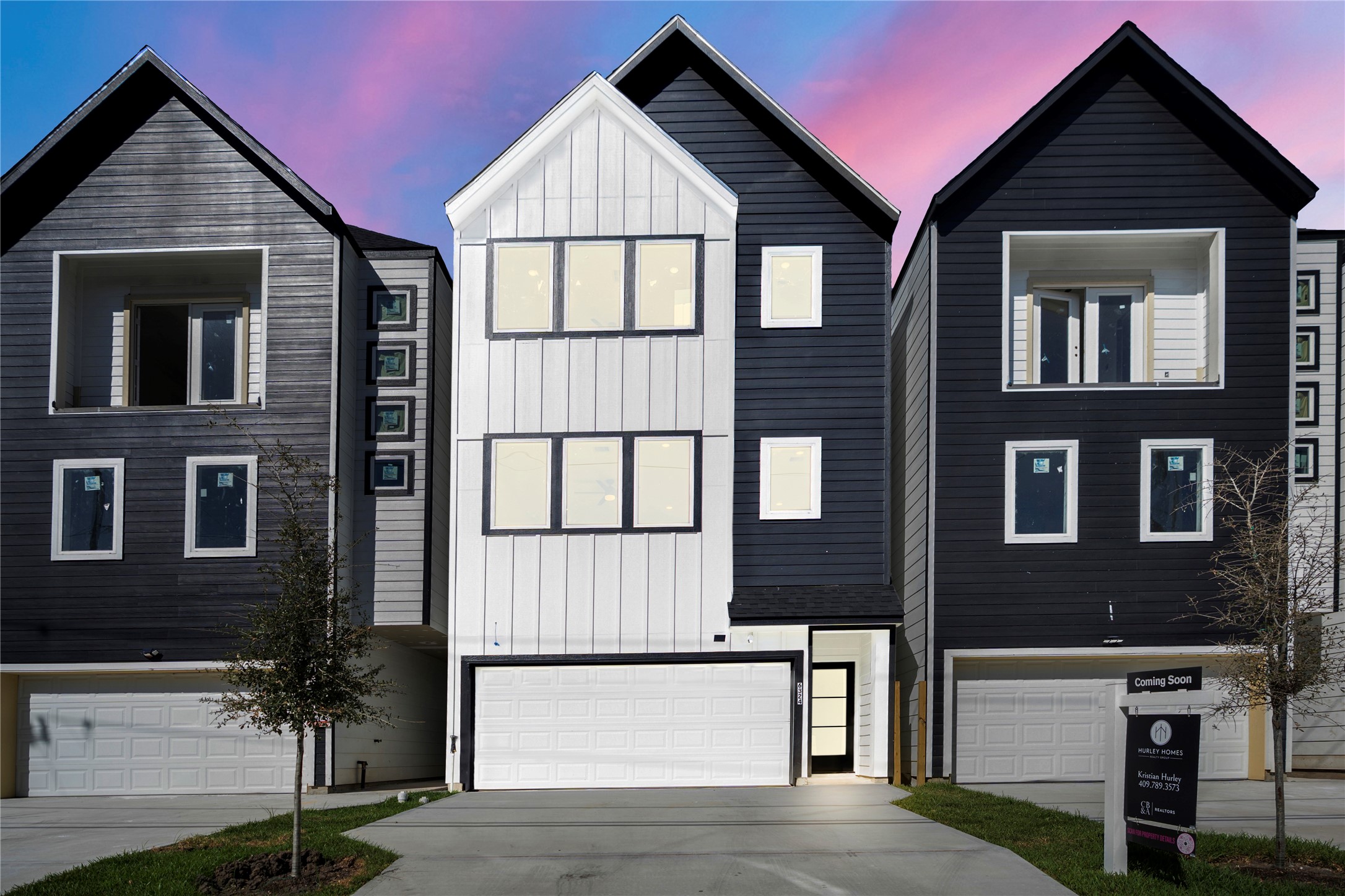 a front view of residential houses with stairs