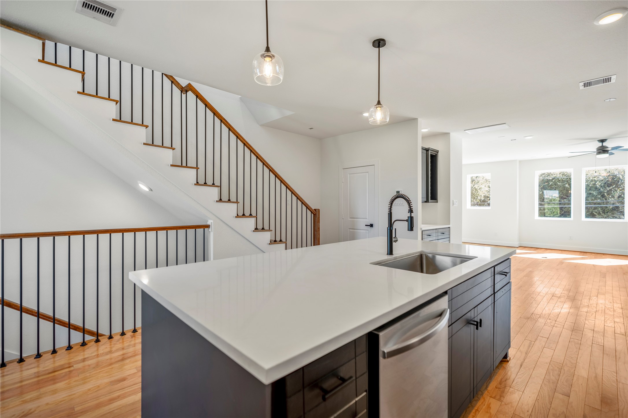 6324 Del Rio Street Houston, TX 77021 - Photo 11 of 50 a kitchen that has a sink a table and chairs in it