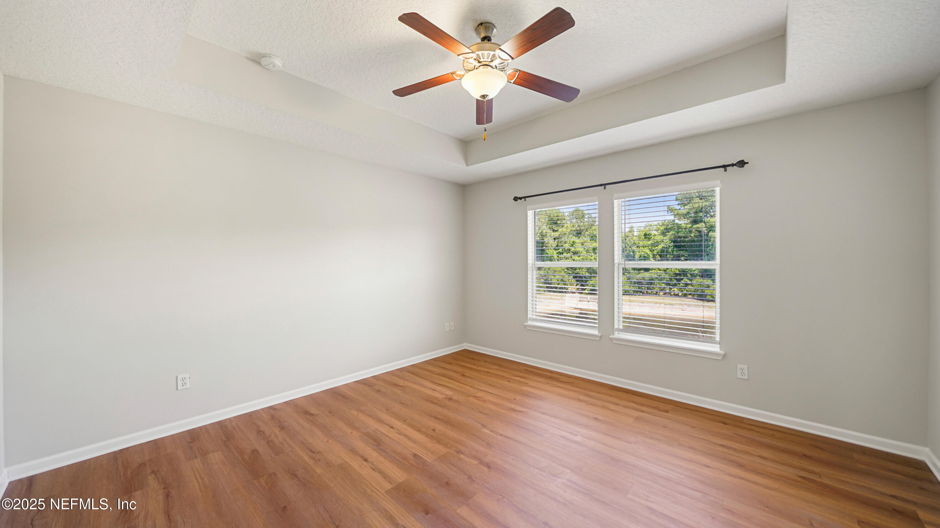18 Amistad Drive St. Augustine, FL 32086 - Photo 15 of 36 an empty room with a window and a fan