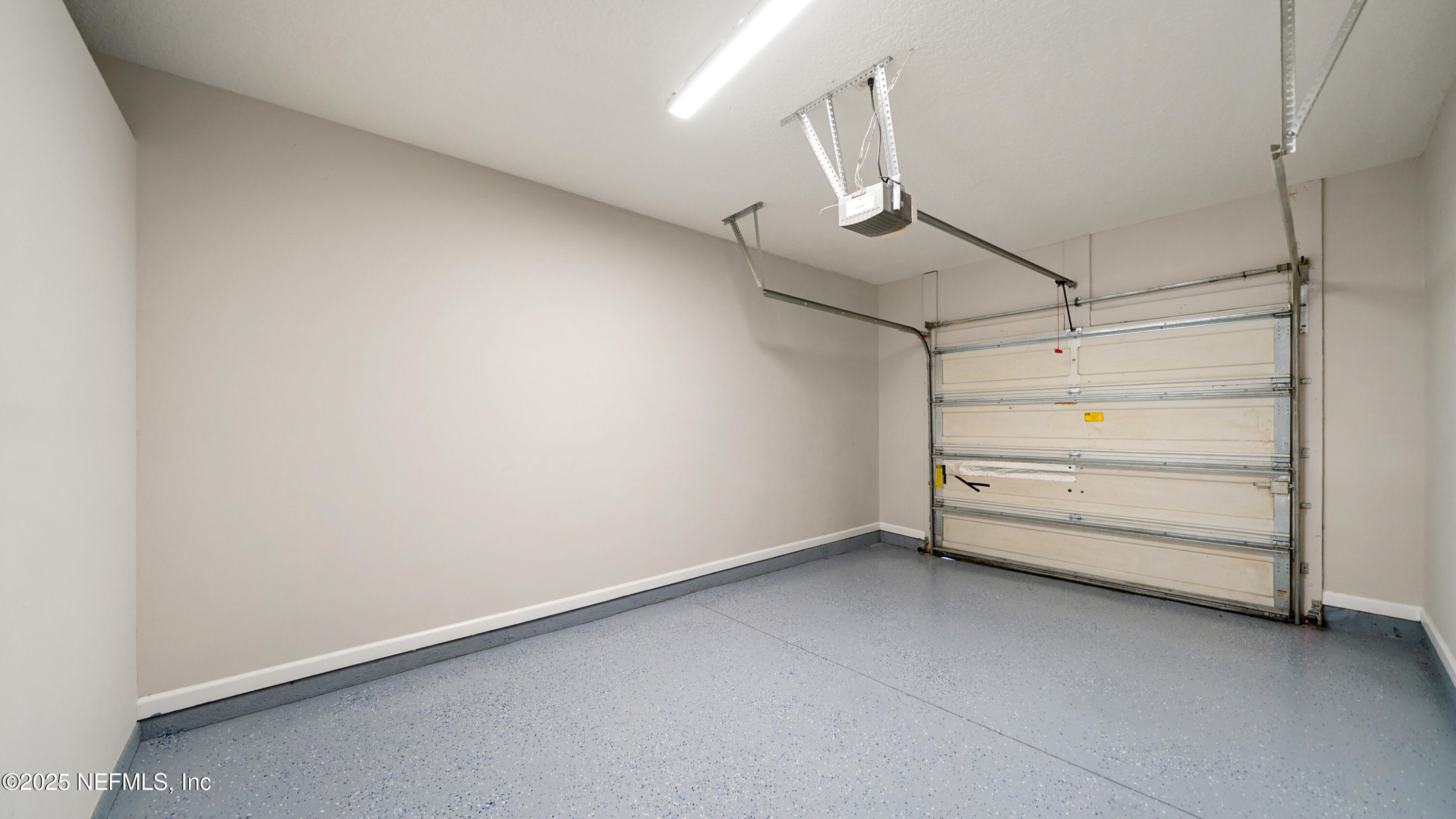 18 Amistad Drive St. Augustine, FL 32086 - Photo 31 of 36 a view of a room with racks on the wall