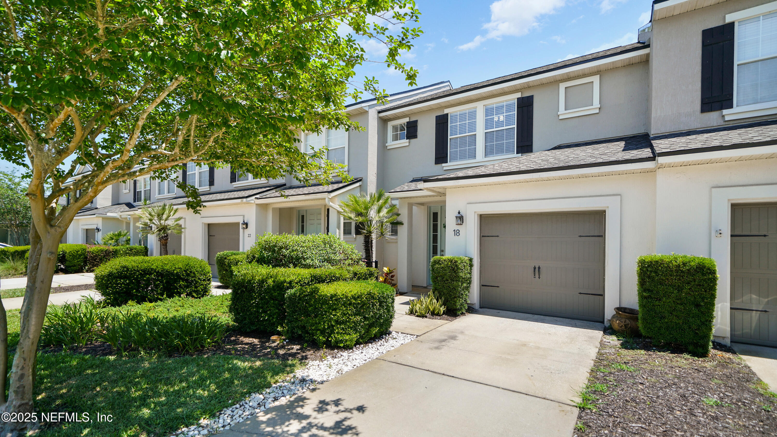 18 Amistad Drive St. Augustine, FL 32086 - Photo 33 of 36 front view of a house with a yard