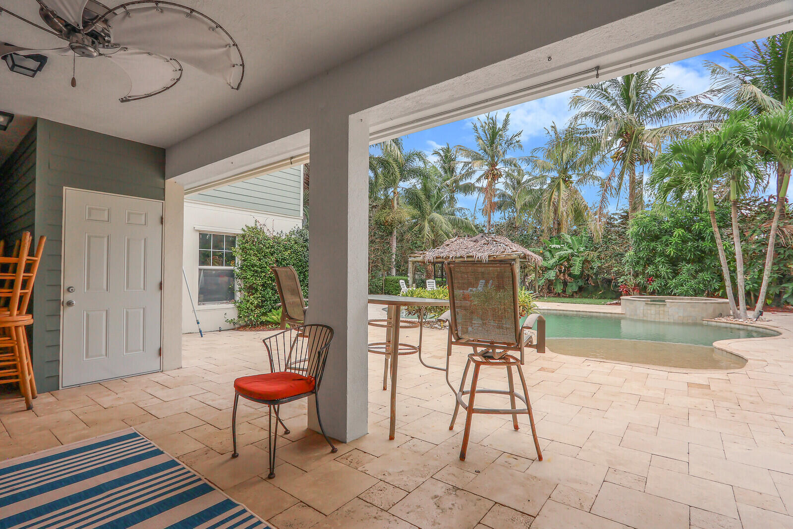 101 St Pierre Way Jupiter, FL 33458 - Photo 46 of 57 a living room with a outdoor seating space