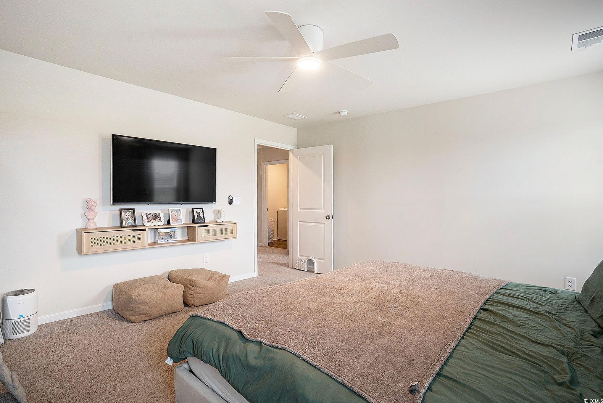 1178 Sennema Circle Myrtle Beach, SC 29588 - Photo 14 of 31 Bedroom with carpet flooring and ceiling fan