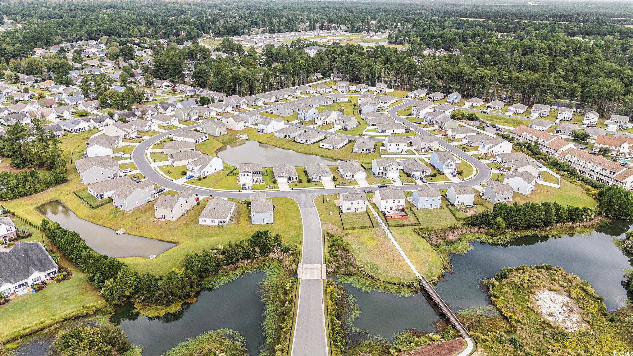 1178 Sennema Circle Myrtle Beach, SC 29588 - Photo 29 of 31 Aerial perspective of suburban area featuring a large body of water