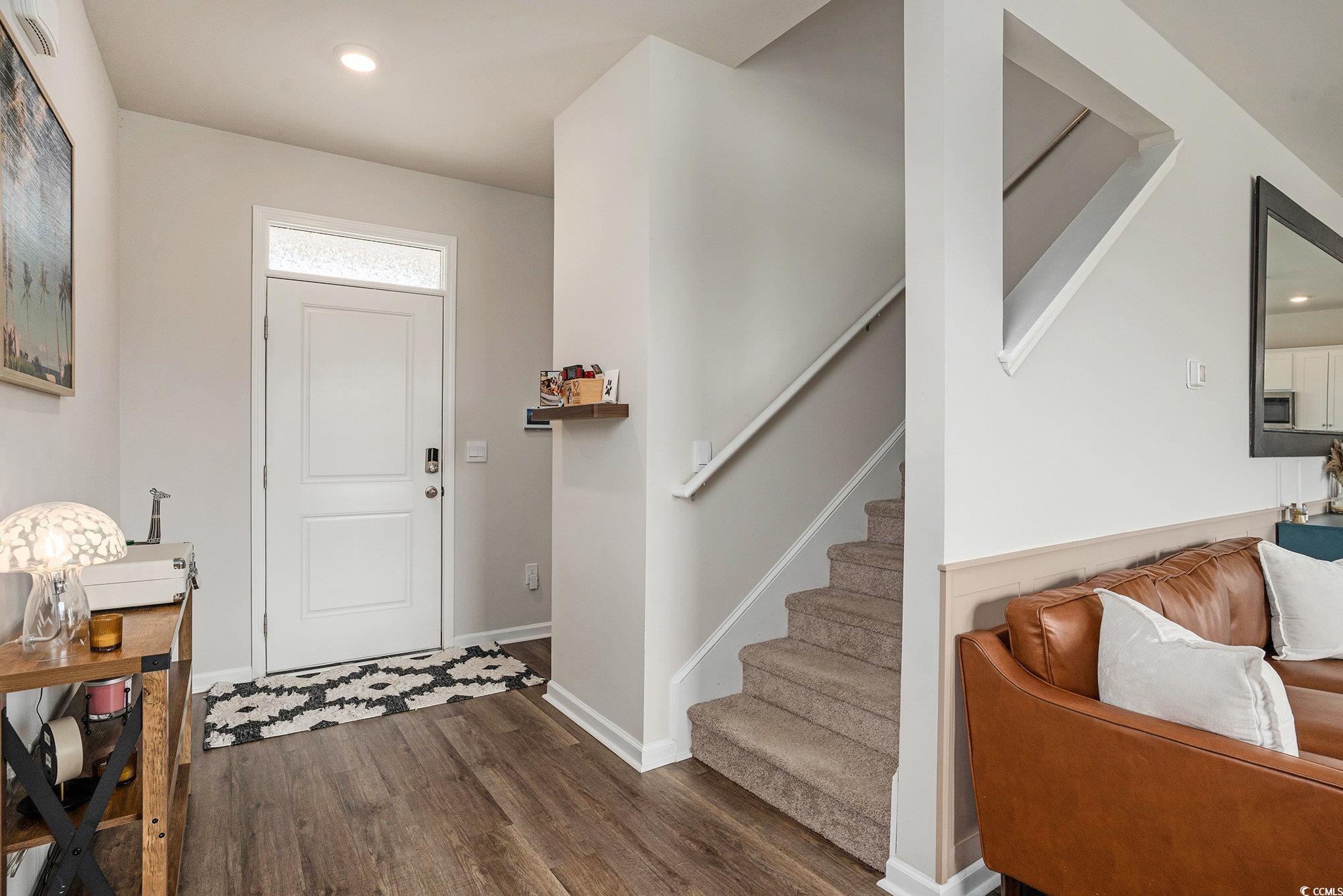 1178 Sennema Circle Myrtle Beach, SC 29588 - Photo 4 of 31 Entryway featuring dark wood-style floors, recessed lighting, and stairway