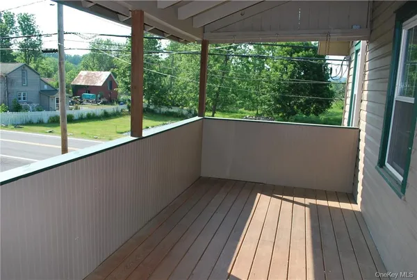 a view of backyard with green space