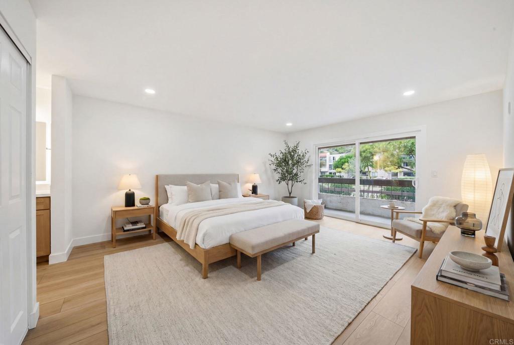 6757 Friars Road, Unit 36 San Diego, CA 92108 - Photo 1 of 23 a living room with furniture and a flat screen tv