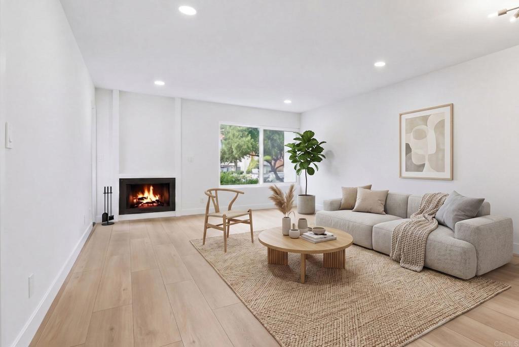6757 Friars Road, Unit 36 San Diego, CA 92108 - Photo 11 of 23 a living room with furniture and a fireplace