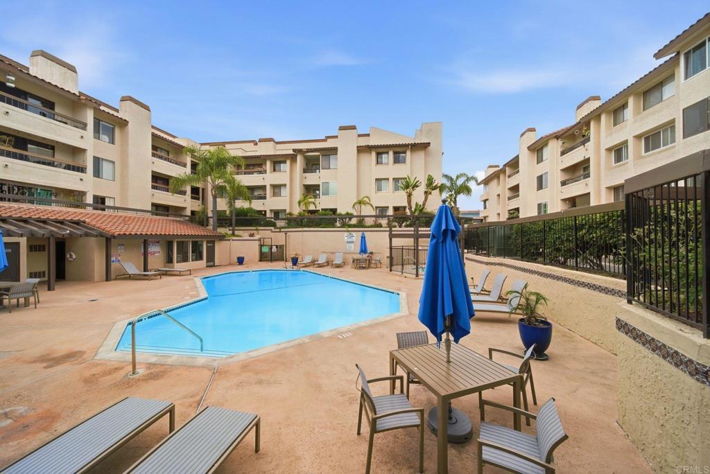 6757 Friars Road, Unit 36 San Diego, CA 92108 - Photo 17 of 23 a view of a building with garden space and sitting area