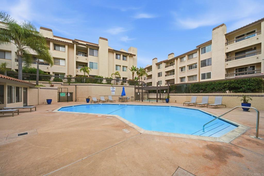6757 Friars Road, Unit 36 San Diego, CA 92108 - Photo 18 of 23 a view of a swimming pool and a outdoor space