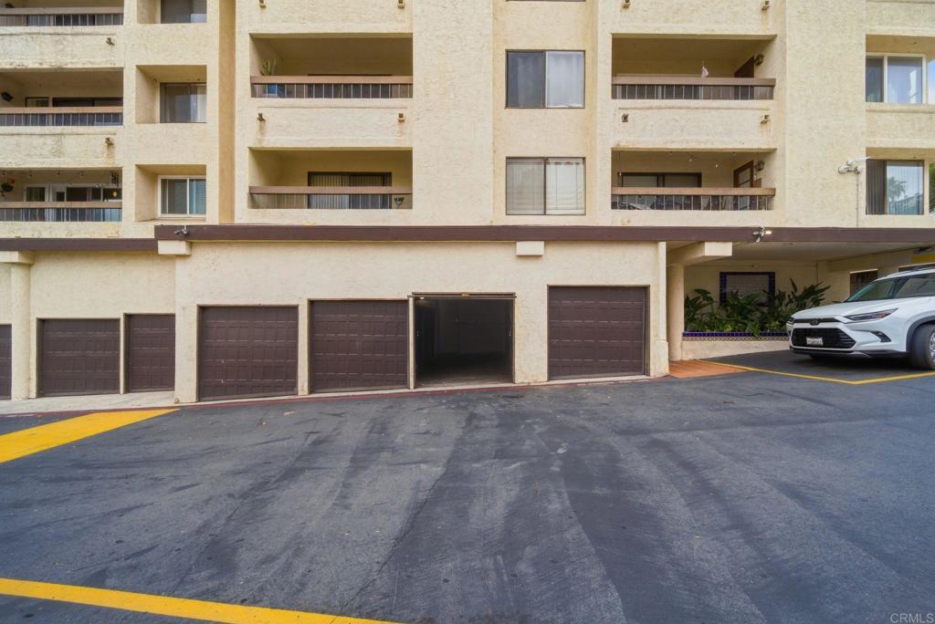 6757 Friars Road, Unit 36 San Diego, CA 92108 - Photo 20 of 23 a view of building with car parked in front of it