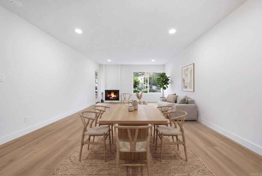 6757 Friars Road, Unit 36 San Diego, CA 92108 - Photo 10 of 23 a view of a dining room with furniture and wooden floor