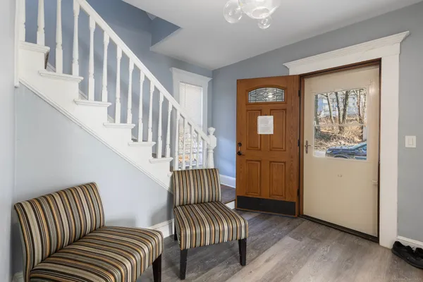 a kitchen that has a table and chairs in it