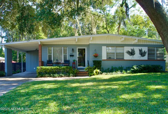 front view of a house with a yard
