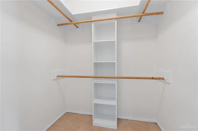 a view of an empty walk in closet